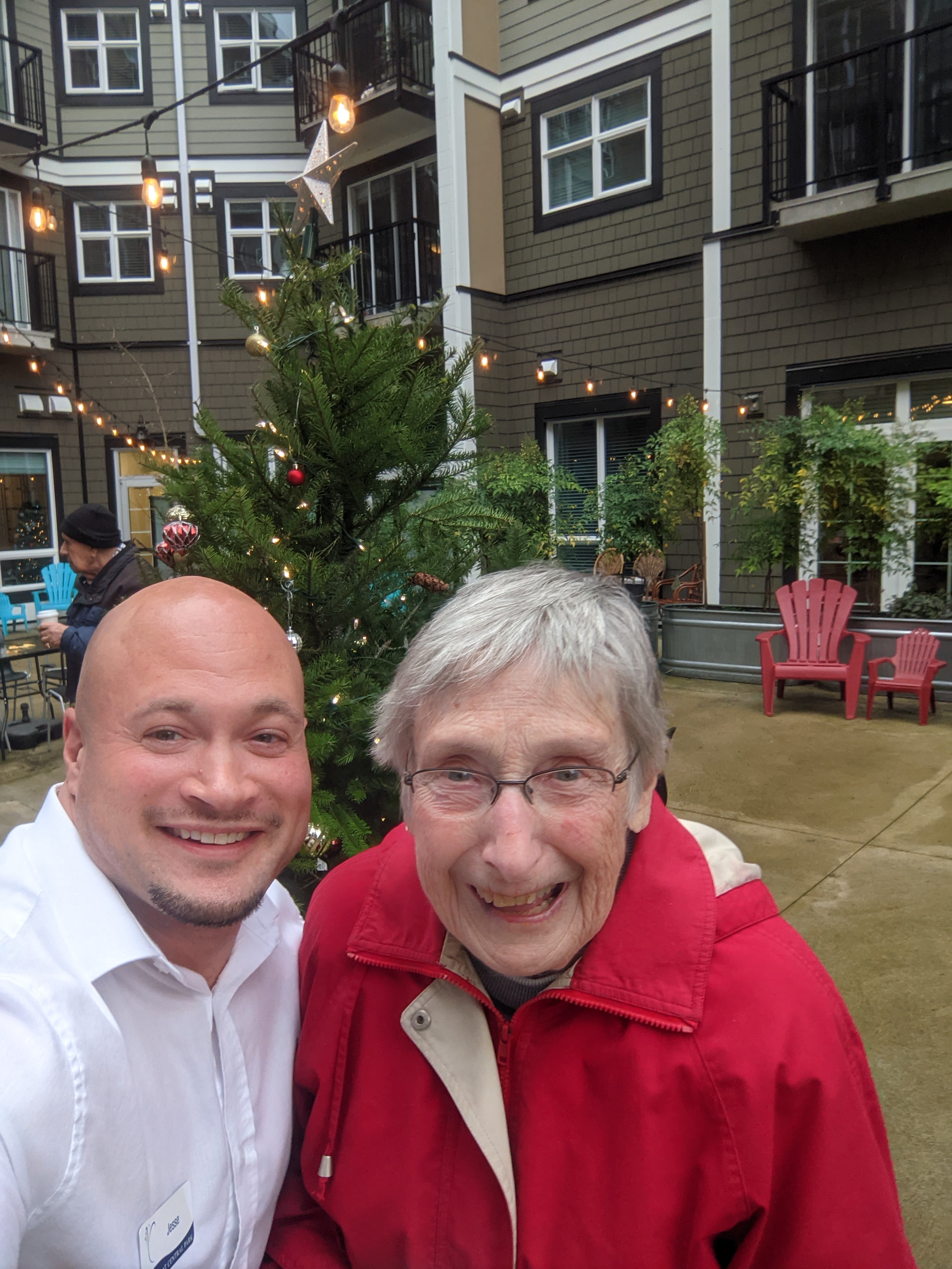 Jesse with senior resident during holiday celebration